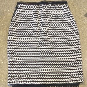 2 skirts white and maroon and black and gold Patterned Women's Skirt